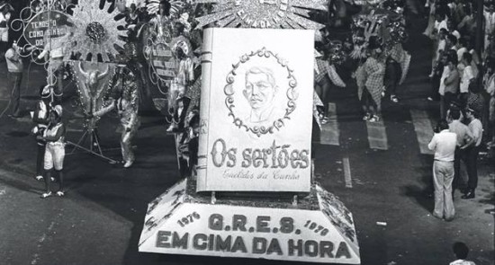 emcimadahora1976