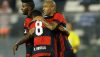 A tal Sul-Americana Football Soccer - Copa Sudamericana - Chile's Palestino v Brazil's Flamengo - Monumental stadium, Santiago, Chile- 21/9/2016 Flamengo's Rodinei (L), Marcio Araujo (8) and Emerson Sheik (R) celebrate Sheik's goal against Palestino. REUTERS/Ivan Alvarado